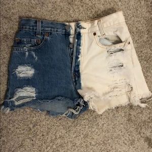 Levi’s high waisted distressed denim shorts